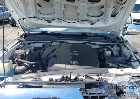 2013 Toyota Tacoma Base V6 из США, поврежденный, VIN 3TMLU4ENXDM118489